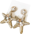 Starfish-shaped earrings with bead and crystal details on a white background