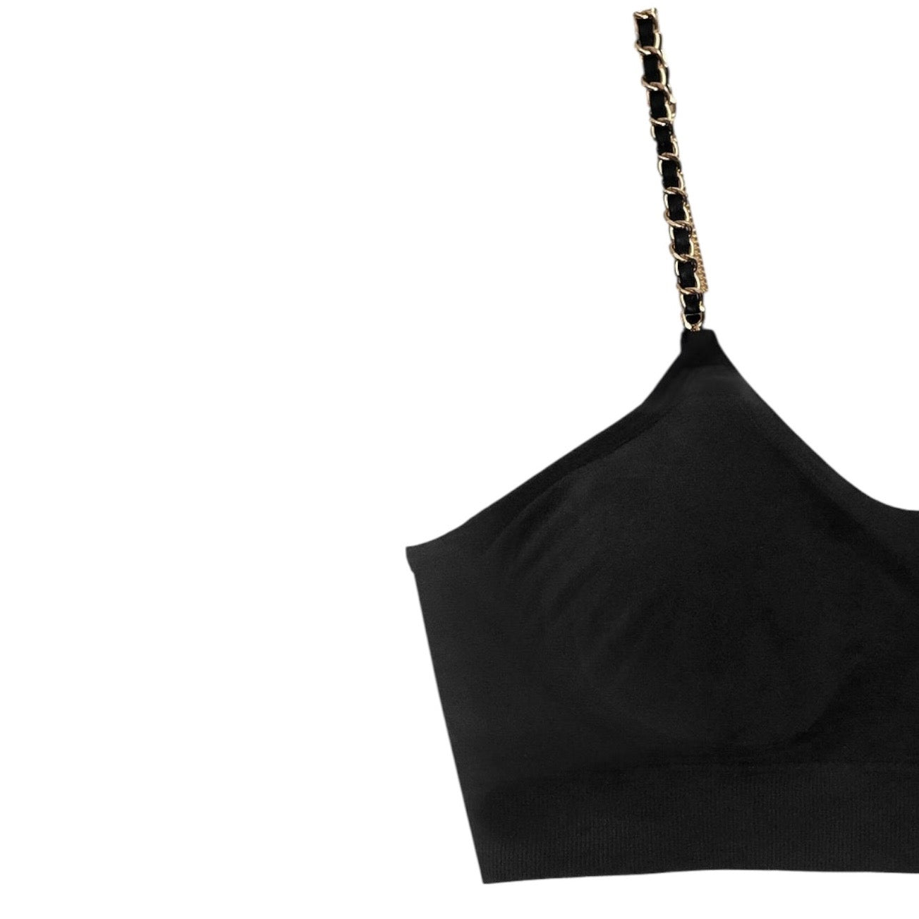 Black crop top with chain detail on a white background