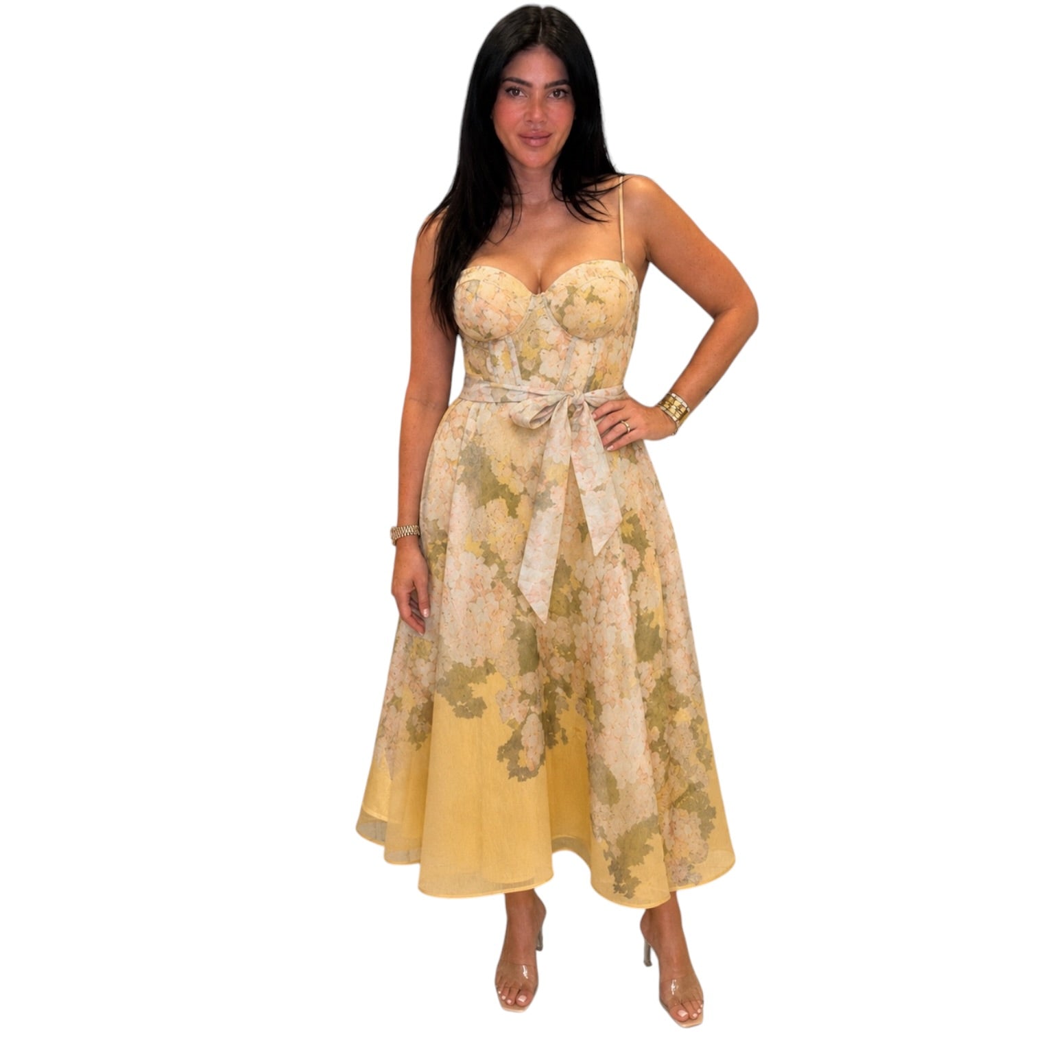 Woman wearing a floral dress on a white background
