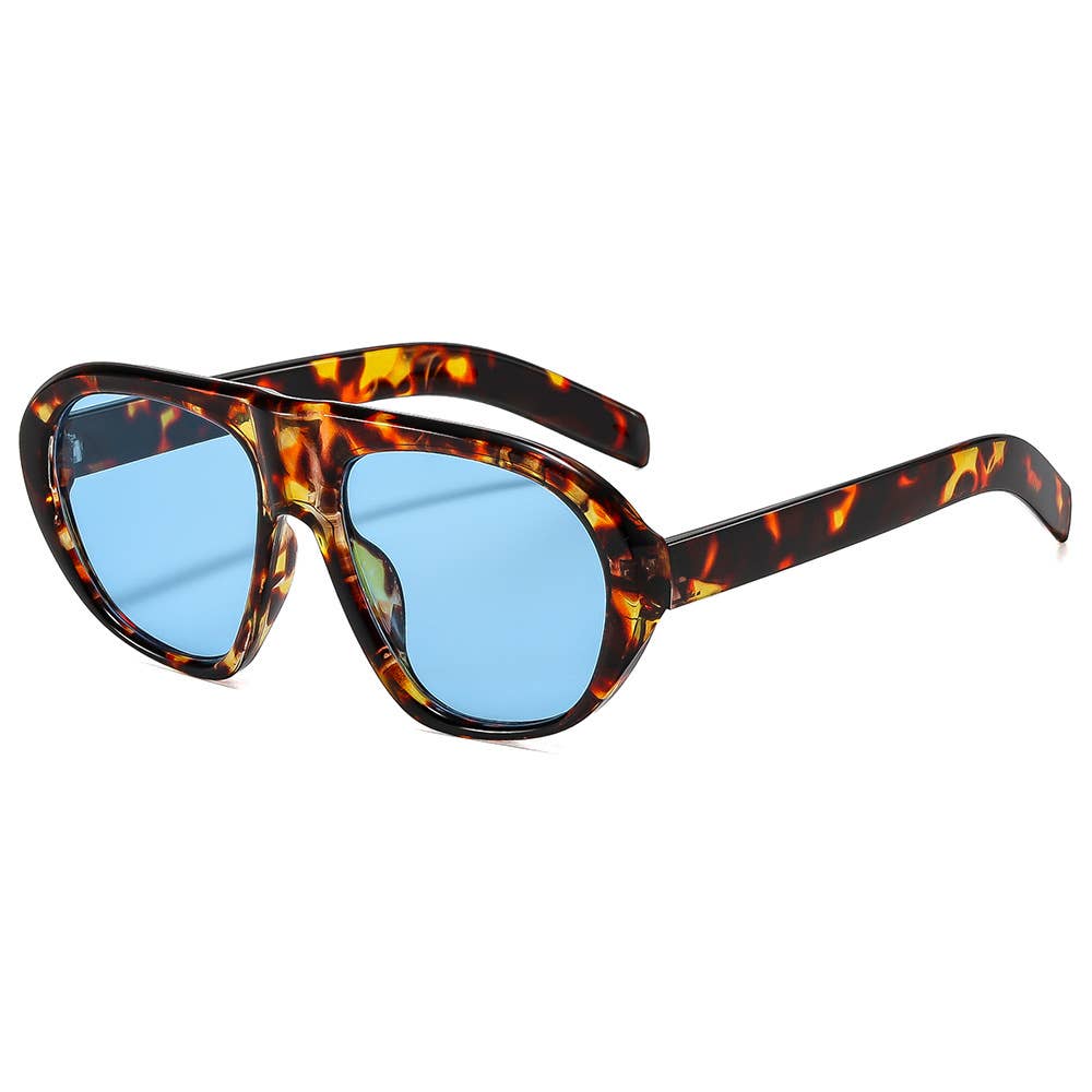 Sunglasses with tortoiseshell frame and blue lenses on a white background