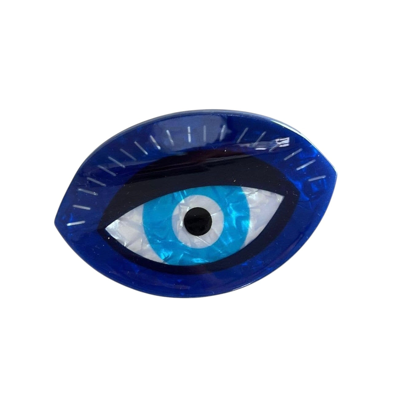 Eye-shaped claw clip with blue and black design on a white background