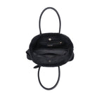 Black faux fur handbag with black leather handles, shown from a top-down view against a white background.