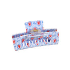 Blue and white striped basket with red lobster pattern on a white background