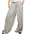 Striped wide-leg pants worn by a person on a white background