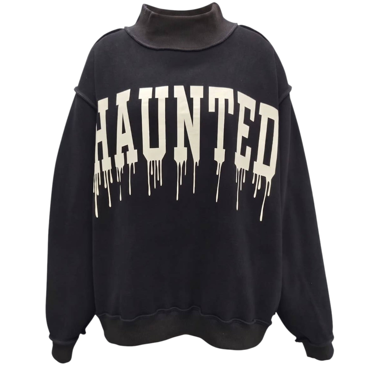 A black crewneck sweatshirt featuring the word 'HAUNTED' printed across the chest in a dripping white font, displayed on a clean white background.