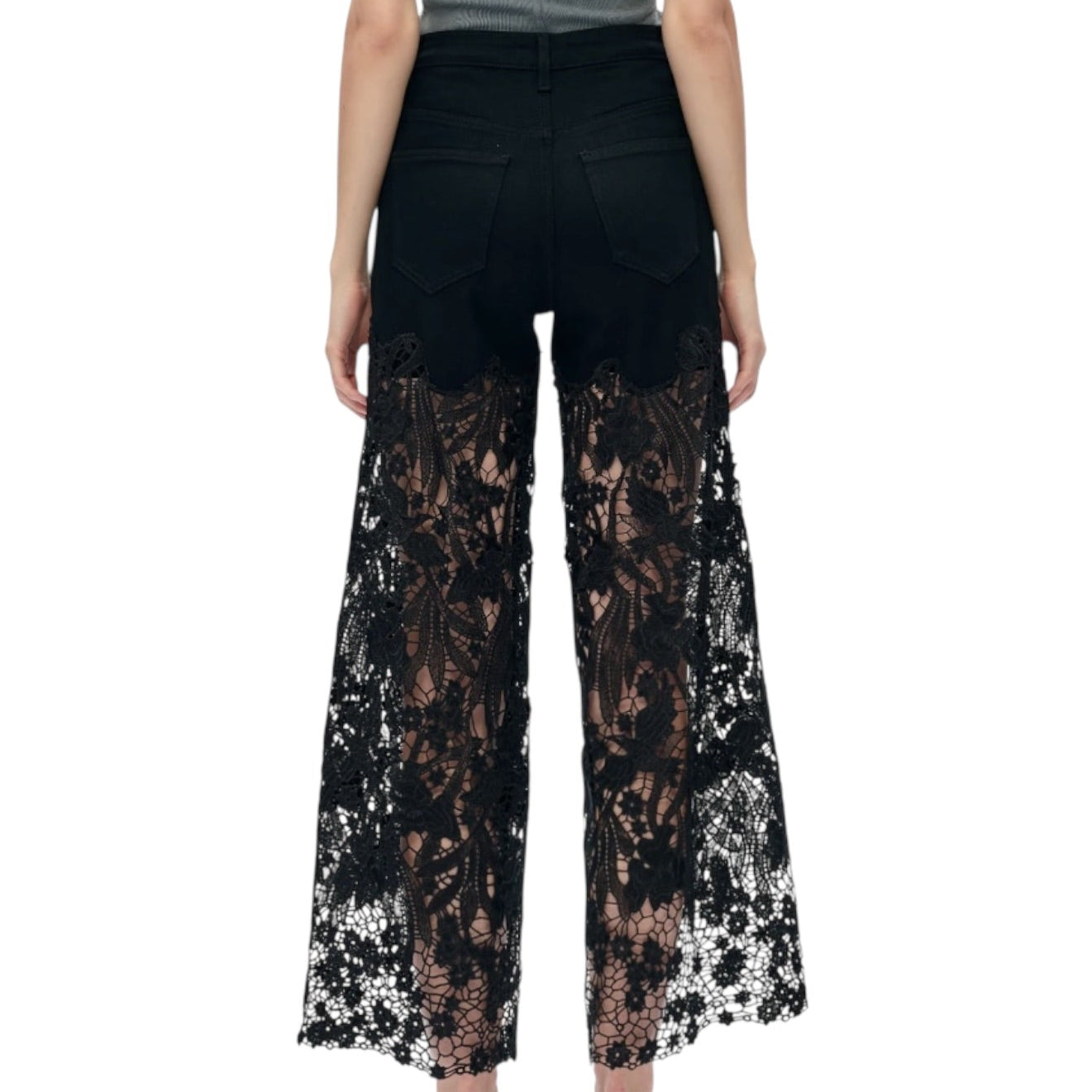 Black lace pants worn by a person on a white background