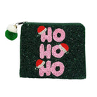 A dark green beaded zip pouch featuring the words 'HO HO HO' in pink beads with red and white Santa hats, and a green and white Christmas ornament zipper pull.