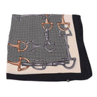 Scarf with horse bit pattern on a beige background