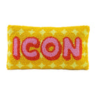 Yellow pillow with 'ICON' text in pink and red on a white background
