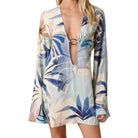 Tropical leaf patterned cover-up on a white background