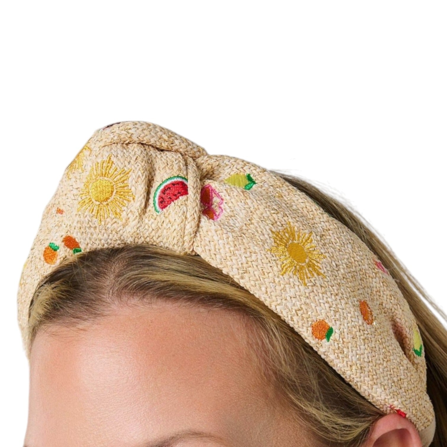 natural knotted headband with graphics of sun and fruit on a white background