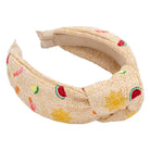 natural knotted headband with graphics of sun and fruit on a white background