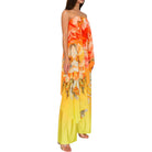 Woman wearing a strapless floral dress with orange and yellow colors on a white background