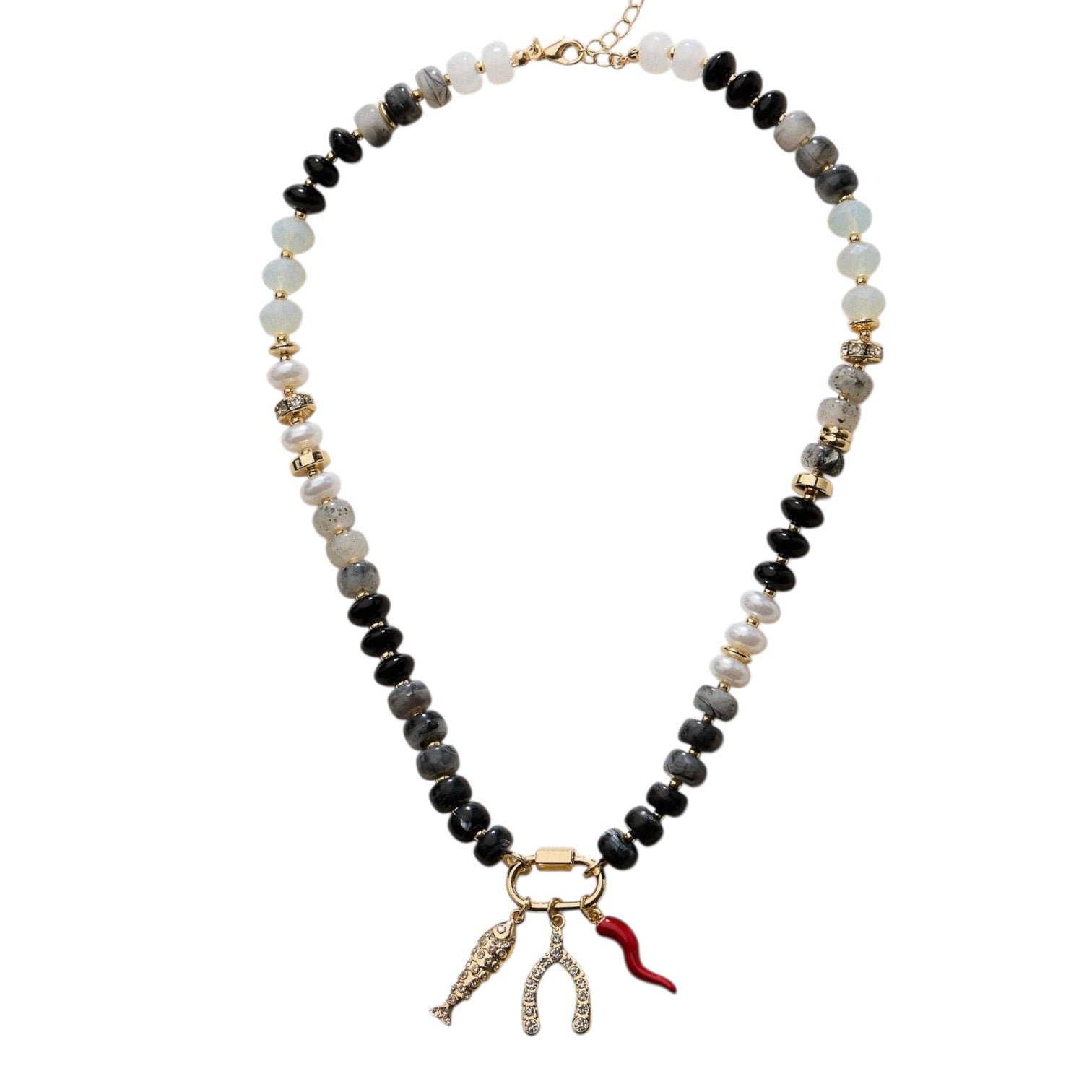 Necklace with black, white, and gold beads and a fish charm on a white background