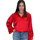 model wearing red satin balloon sleeve blouse