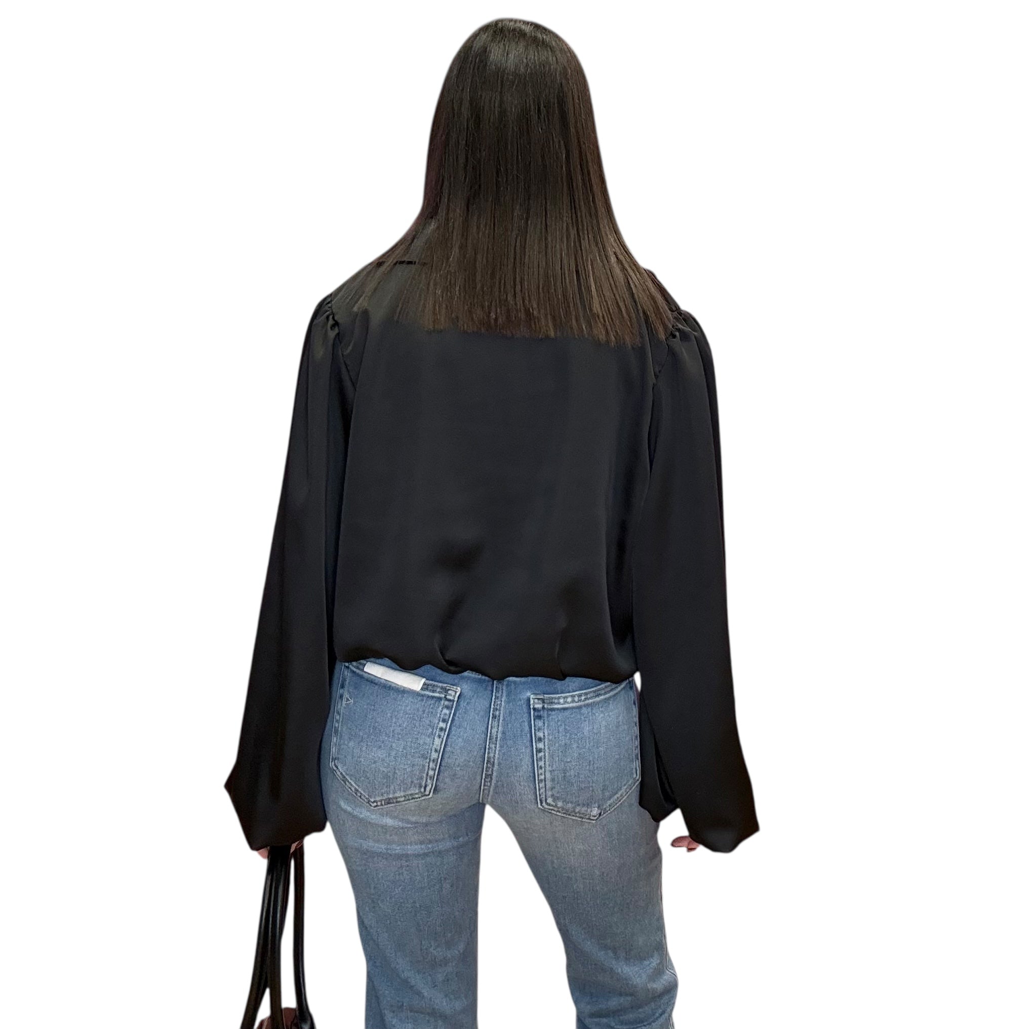 model wearing black satin balloon sleeve blouse