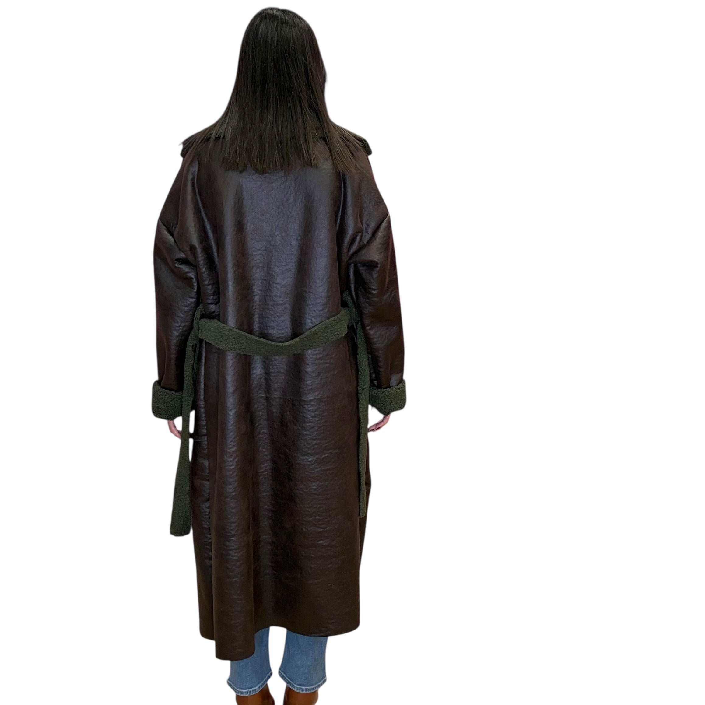 model wearing long olive coat