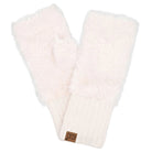 A pair of off-white faux fur and knit wrist warmers with a small brown leather logo patch on the cuff, displayed against a solid white background.