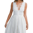 White lace dress on a white background