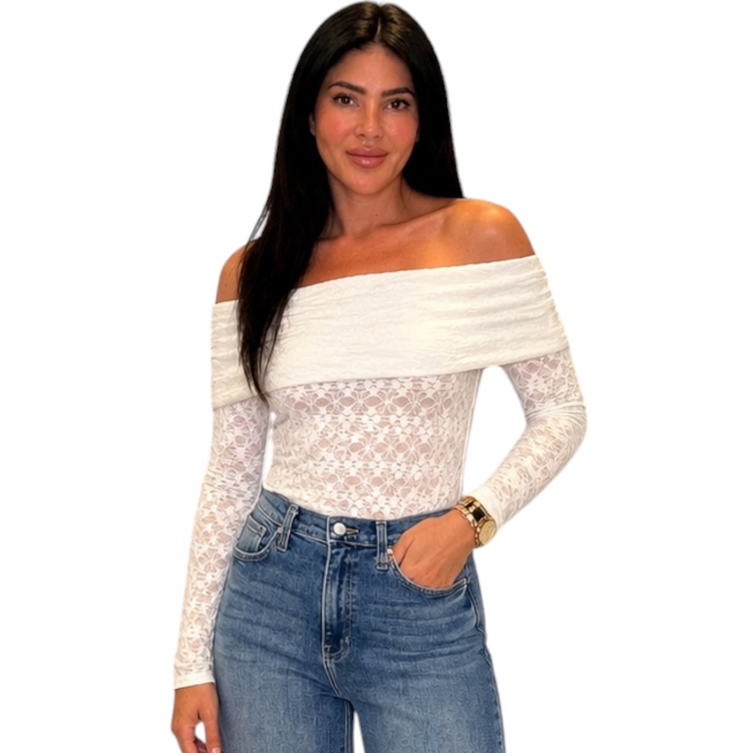 Woman wearing a white off-shoulder top with lace detailing and blue jeans on a white background