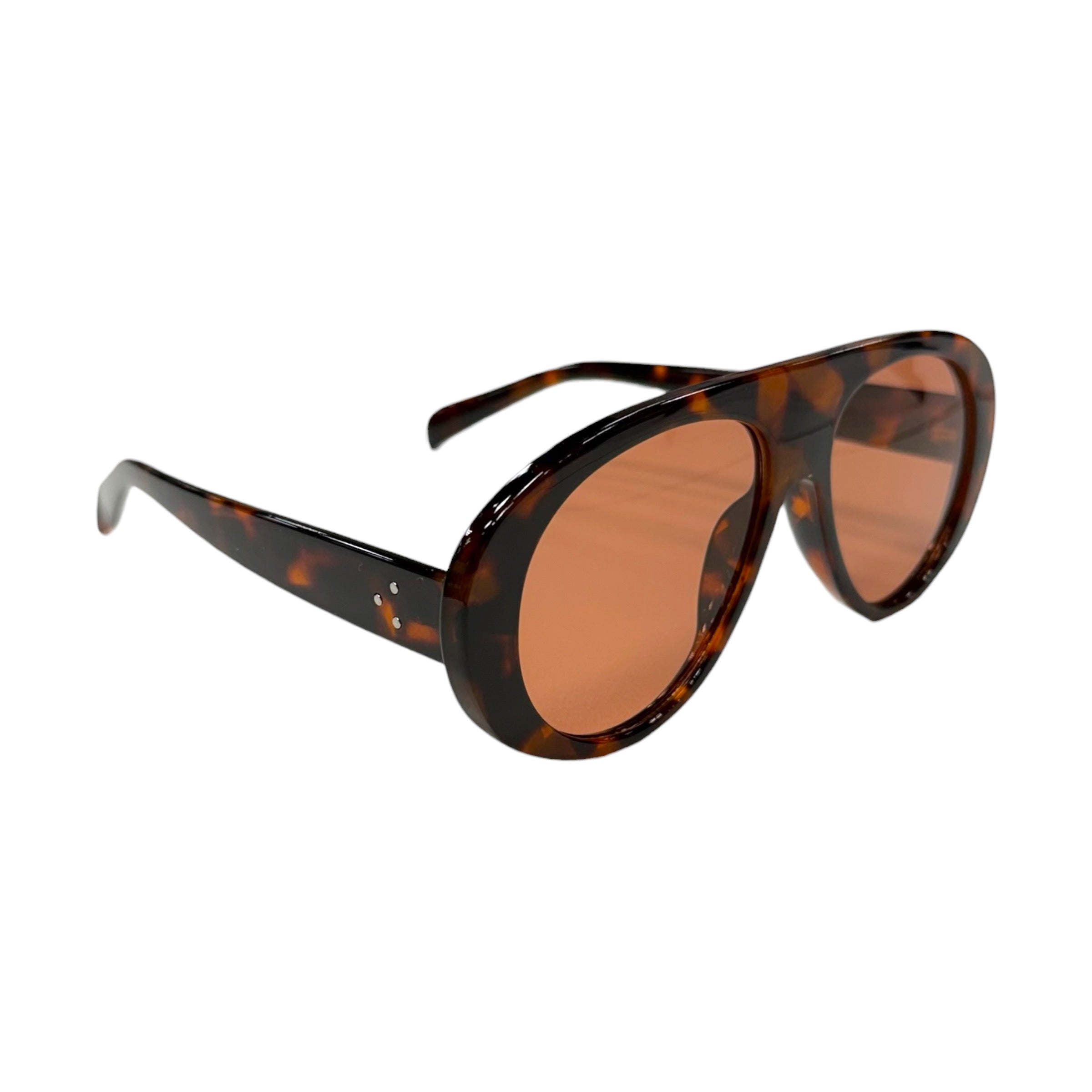 Tortoiseshell sunglasses with brown lenses on a white background