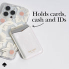 Phone case with card holder and floral design, featuring Kate Spade branding.