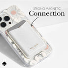 Phone case with 'kate spade' branding and text about strong magnetic connection on a white background.