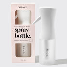 White spray bottle with 'kitsch' branding next to its packaging on a light gray background