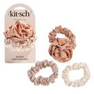 Set of ruched satin scrunchies with packaging on a white background
