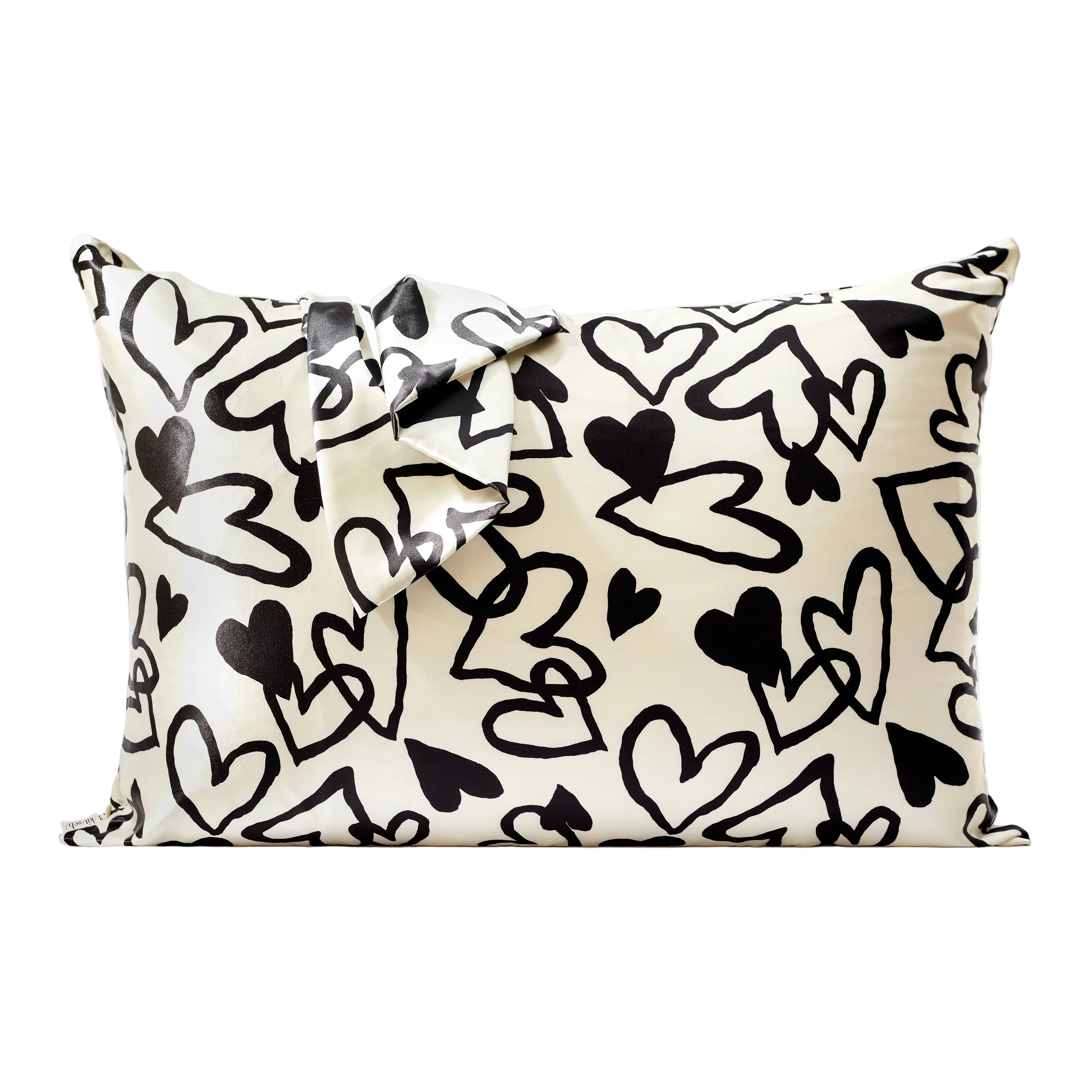 Pillow with black heart pattern on a white background