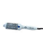 White hairbrush with black bristle head on a light gray background