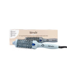 Kitsch hairbrush with packaging on a white background