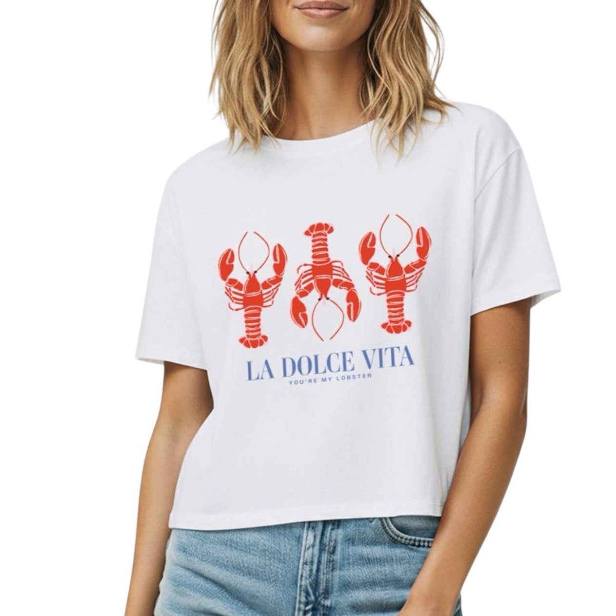 Person wearing a white t-shirt with red lobster graphics and 'La Dolce Vita' text on a white background