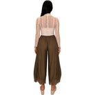 A woman shown from the back wearing a beige lace long-sleeve crop top and brown wide-leg pants with lace trim at the hems, against a plain white background.
