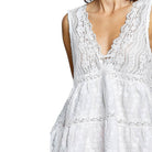 White lace dress on a white background