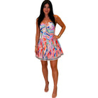 Woman wearing a colorful set on a white background