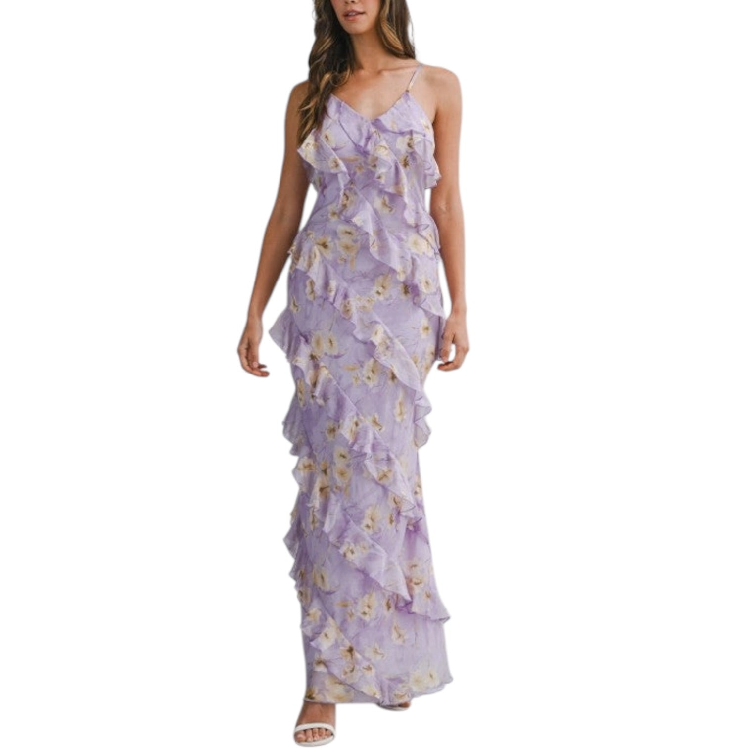 Woman wearing a floral purple dress on a white background