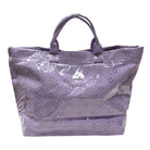 Purple tote bag with floral pattern on a white background