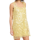 Yellow sequin dress on a white background