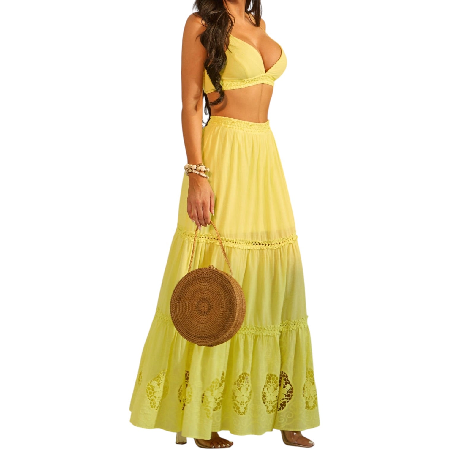 Woman wearing a yellow skirt set with a white background
