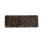 A rectangular faux fur headband with a brown and black leopard print pattern, shown flat against a white background.