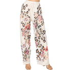 Floral and leopard print pants on a white background
