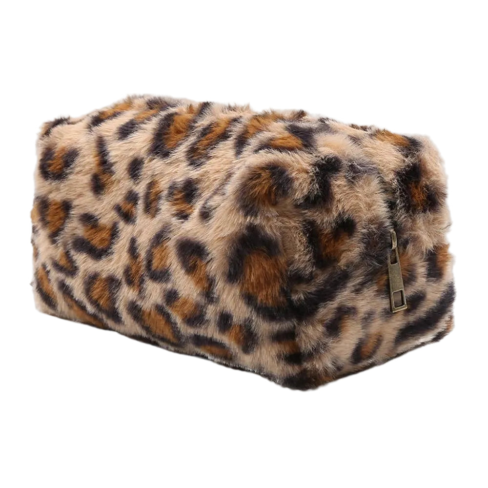 A rectangular faux fur cosmetic bag with a brown, black, and beige leopard print pattern, featuring a small gold zipper pull, shown on a light gray background.