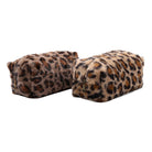 Two leopard print makeup bags on a white background