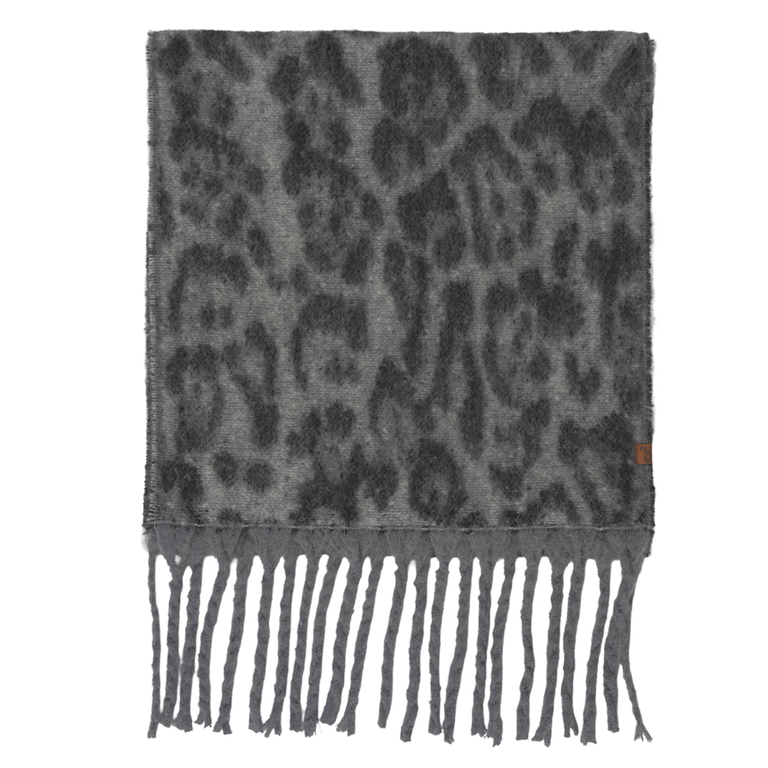 Leopard pattern fringe scarf, soft and stylish winter accessory.