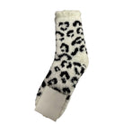 A single fuzzy white sock with a black leopard print pattern, shown against a plain white background with a paper tag attached.