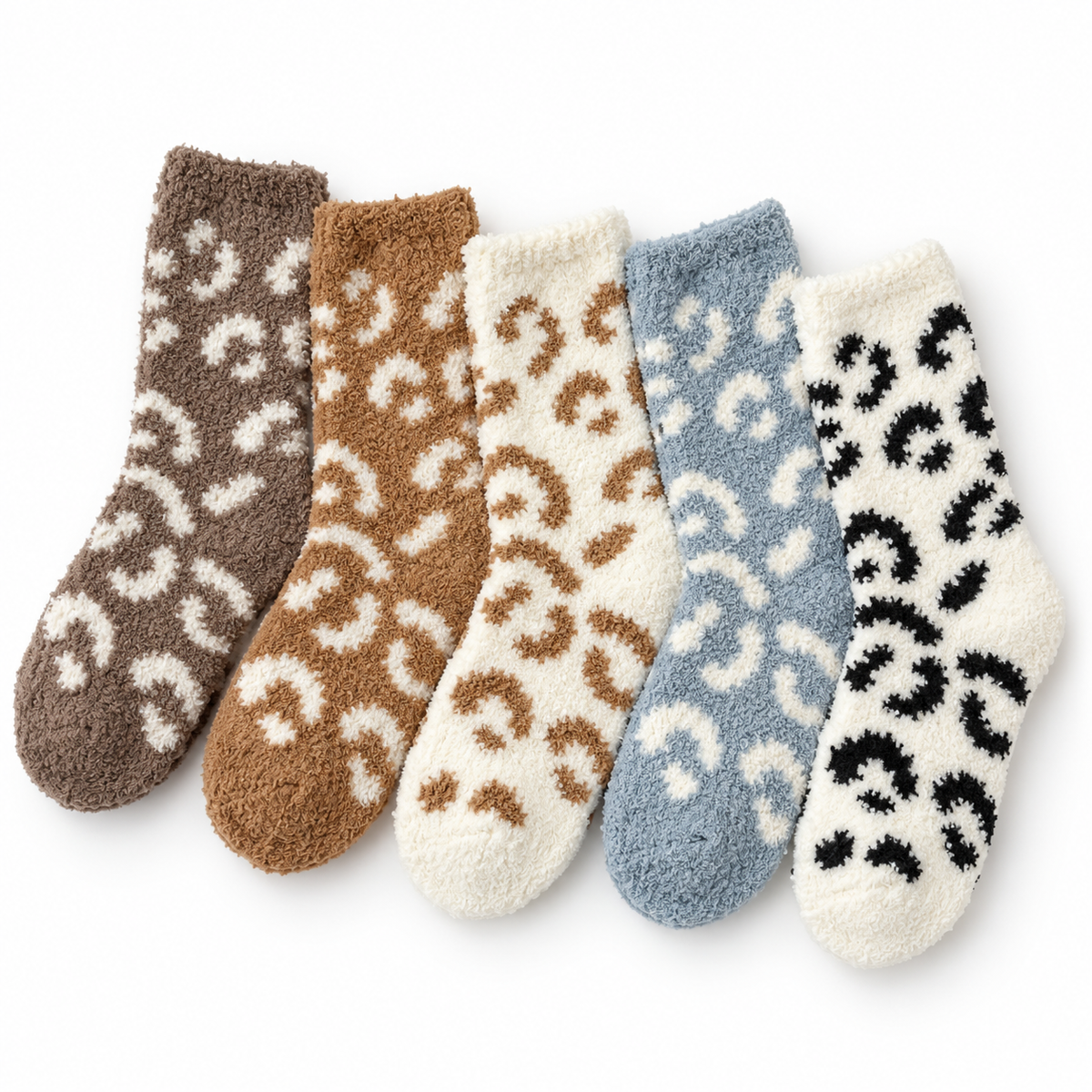 Five pairs of fuzzy ankle socks arranged in a fan shape on a white background, each with a contrasting leopard-like spot pattern in brown, tan, cream, light blue, and black.