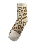 A single fuzzy knit sock in a brown and cream leopard print pattern, shown against a plain white background with a blank white paper tag attached at the bottom.
