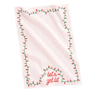 A light pink tea towel with a festive Christmas design, featuring a border of green string lights with red and pink bulbs and the phrase 'let's get lit' in red script at the bottom.