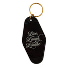 Black keychain with 'Live, Laugh, Loathe' text on a white background